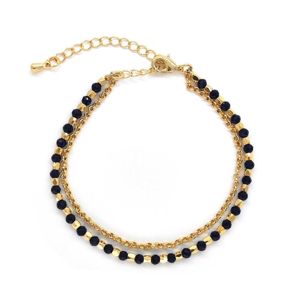 Black agate bracelet with gold accents