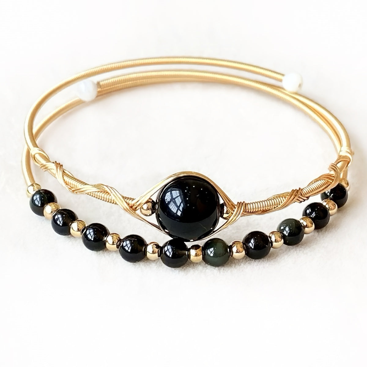 Black obsidian bangle for energy shielding and grounding