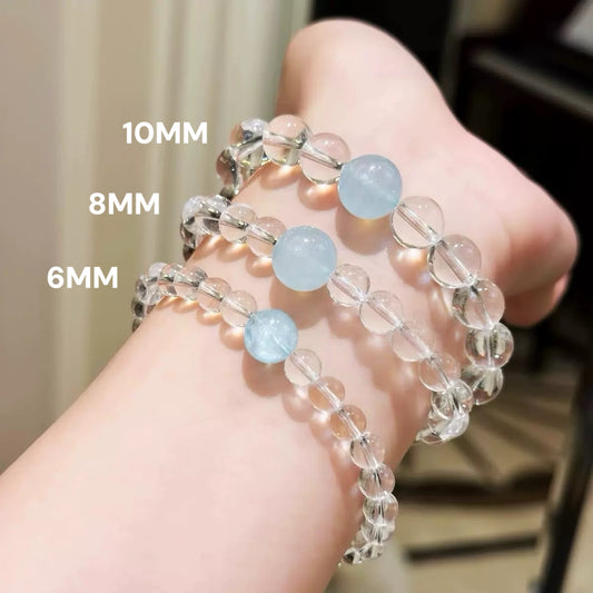 Wrist view showing 6mm, 8mm, and 10mm sizes of Clear Quartz & Aquamarine Bracelet