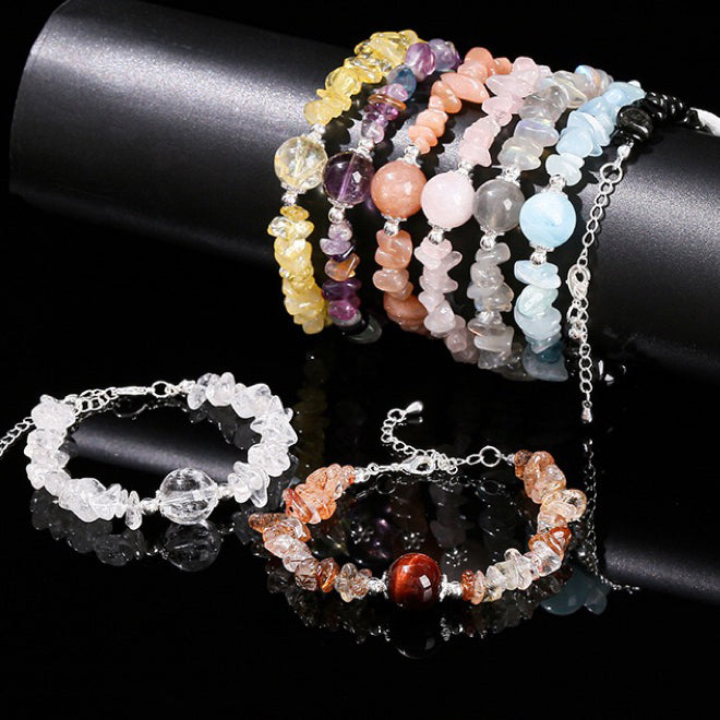 Assorted crystal chip bracelets featuring Clear Quartz, Rose Quartz, Amethyst, Obsidian, Citrine, Moonstone, and more – energy healing stones for love, protection, and abundance.