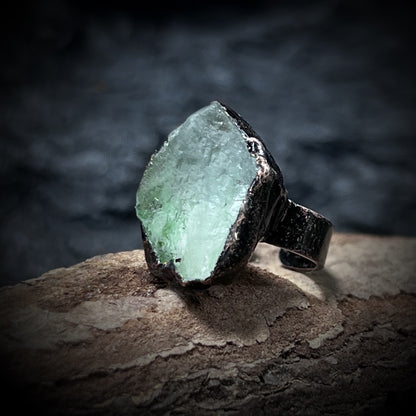 green fluorite raw crystal ring close-up

