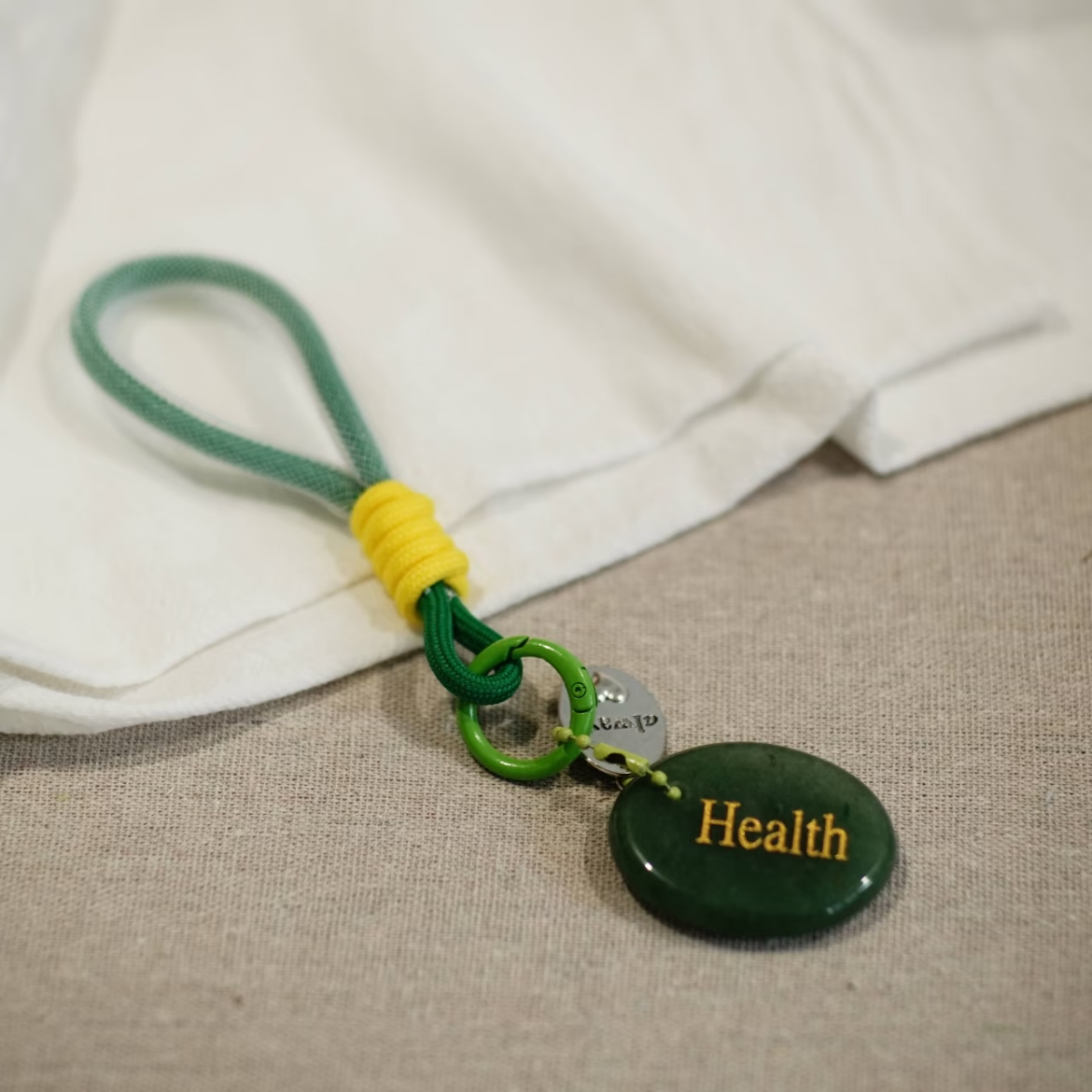 Health crystal keychain with green aventurine