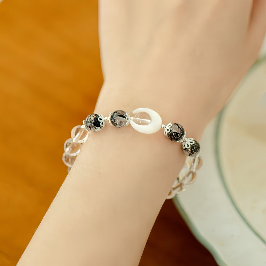 Model wearing feminine crystal bracelet  