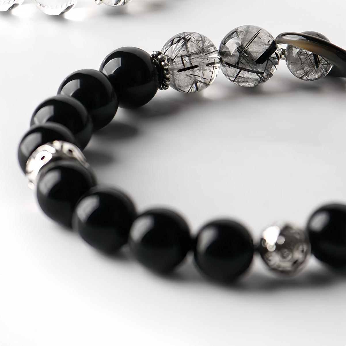 Close-up of obsidian crystal bracelet  