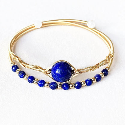 Royal blue lapis lazuli bangle with gold wire wrap