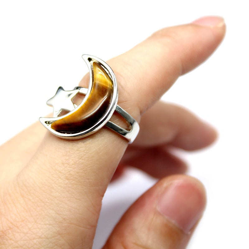 Moon & Star ring with Tiger’s Eye crystal worn on finger
