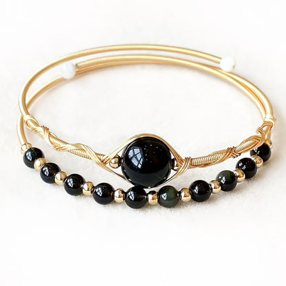 Black obsidian bangle for energy shielding and grounding