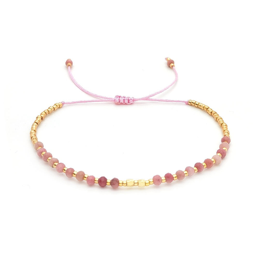 Rhodochrosite crystal bracelet in soft pink tones with gold highlights