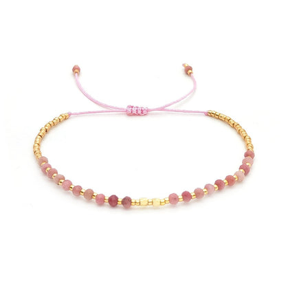 Rhodochrosite crystal bracelet in soft pink tones with gold highlights