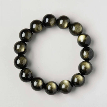 Golden Obsidian bracelet shown in a circle on white surface