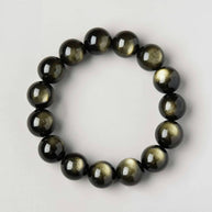 Golden Obsidian bracelet shown in a circle on white surface